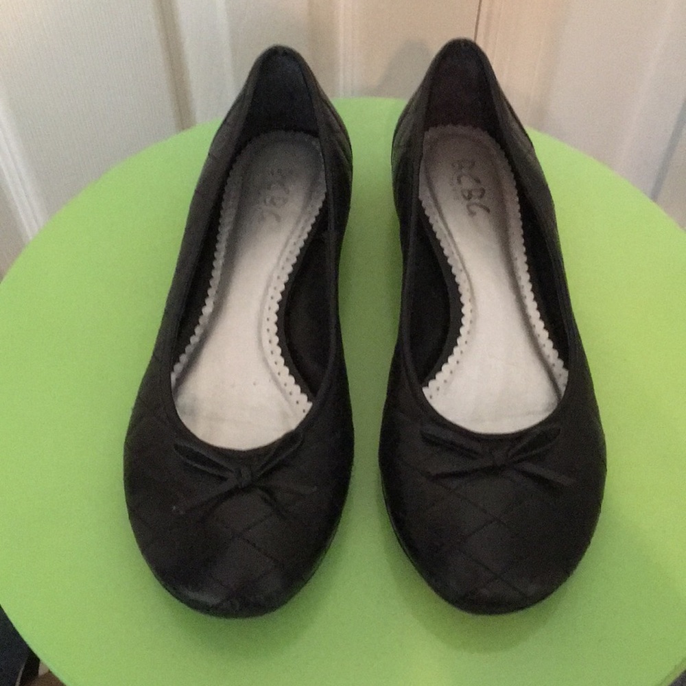 BCBG quilt pattern leather flats with bow tie.